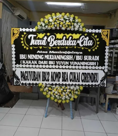 Papan Bunga Duka Lembah Dolopo