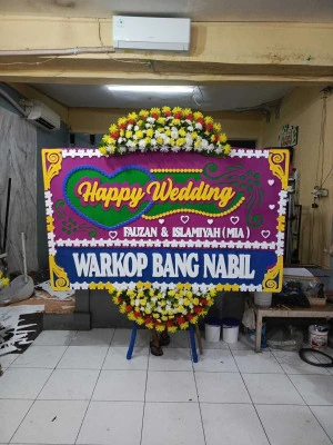 Papan Bunga di Lembah Dolopo