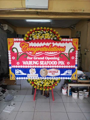 Papan Bunga di Lembah Dolopo